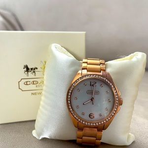 Womans COACH mother of Pearl watch rose gold